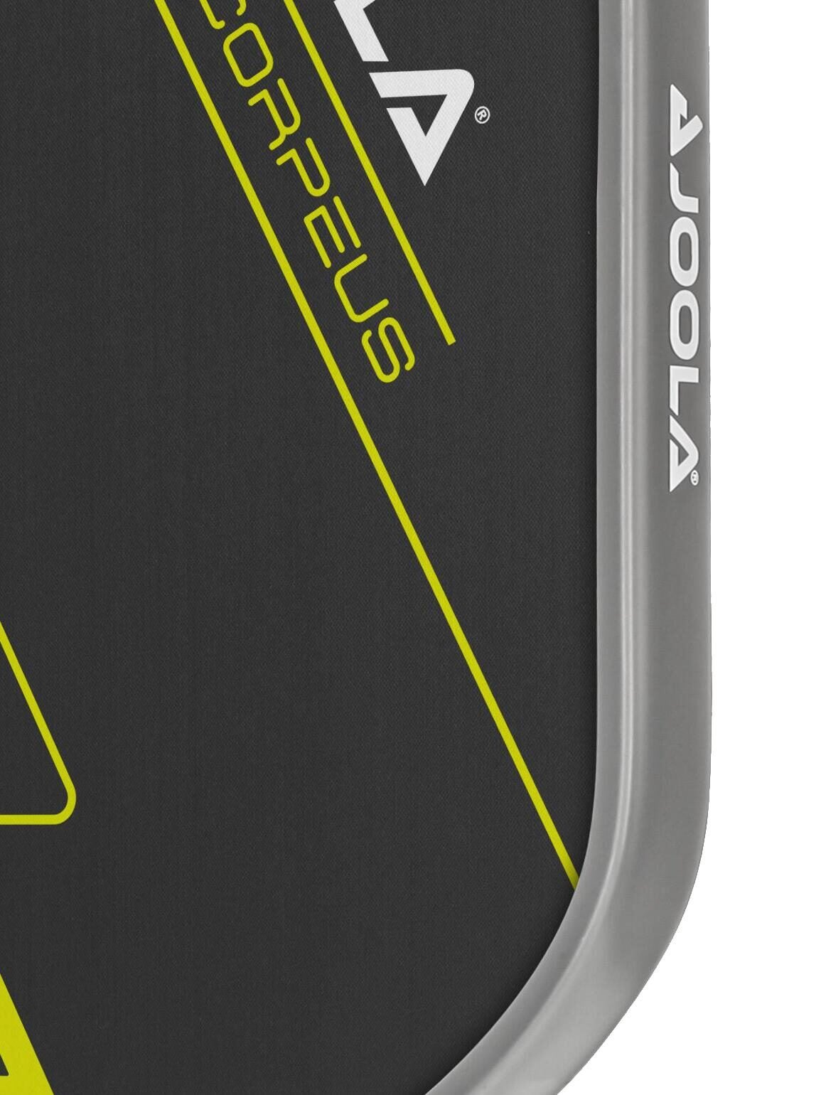 Close-up of a JOOLA Anna Bright Scorpeus CFS 14mm Pickleball Paddle showing the logo and part of the edge. The paddle has a black and yellow design, with a curved gray edge.