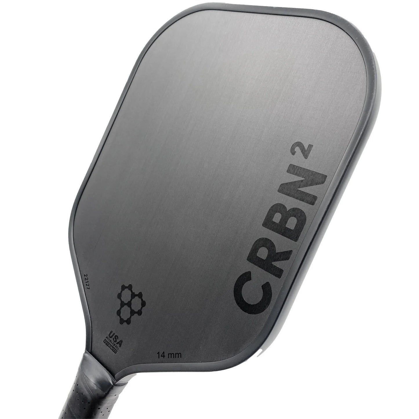 Close-up of a Pickleballist CRBN 2 - 14mm pickleball paddle featuring a textured surface and model branding, viewed on a white background.