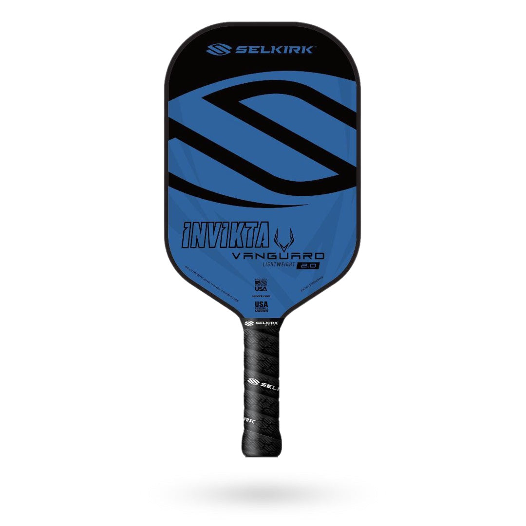 Image of a Selkirk Vanguard Invikta Pickleball Paddle with a blue face and black handle. The paddle, crafted by Selkirk, features the Selkirk logo and model name printed on it. It also comes with a limited lifetime warranty.