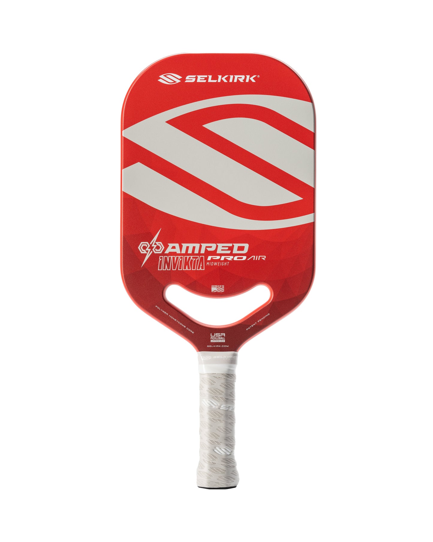 A red and white Selkirk AMPED Pro Air Invikta Pickleball Paddle with a white grip.