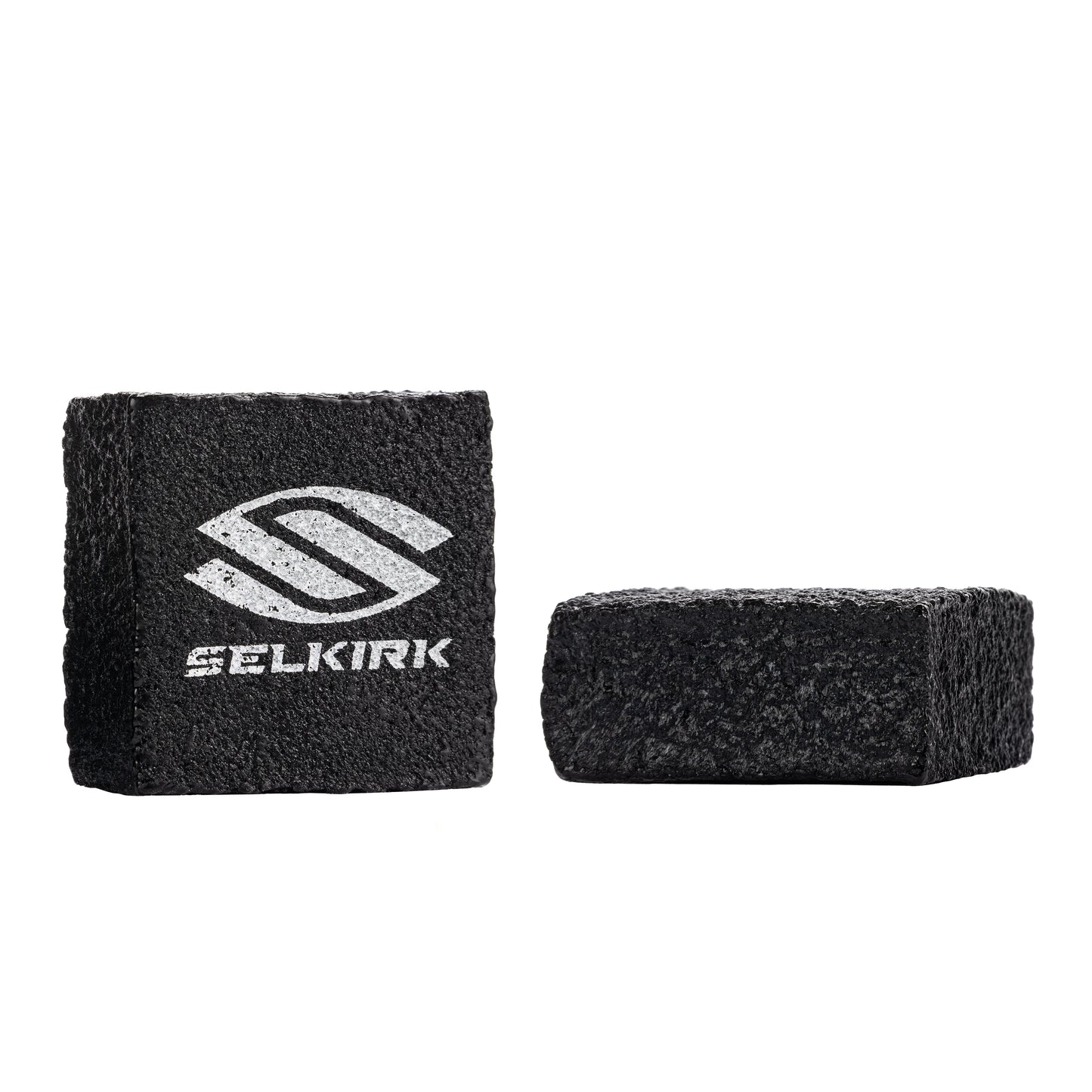 Two black Pickleballist branded pickleball paddles grips, one facing front with logo visible and the other turned showing the side, isolated on a white background.