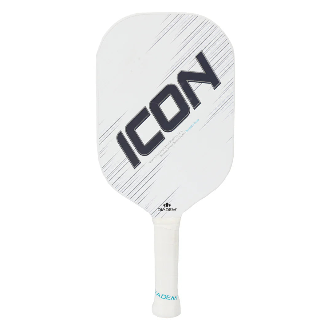 A white Diadem Icon V2 XL Pickleball Paddle with the word "ICON" in large black letters on the face. The paddle's handle has the brand name "Diadem" printed at the bottom.