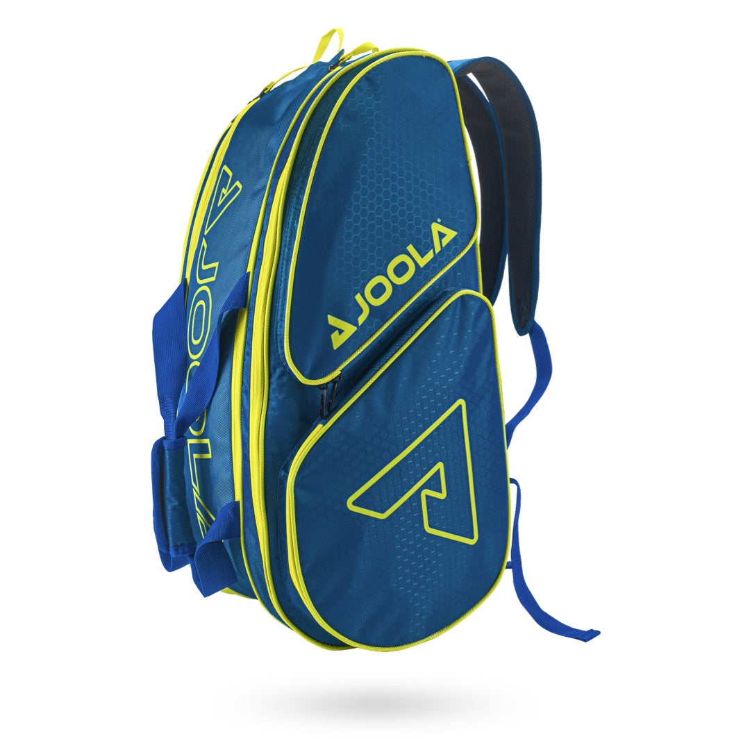 Blue and yellow Pickleballist branded JOOLA Tour Elite Pro Bag Pickleball Bag with multiple compartments, isolated on a white background.
