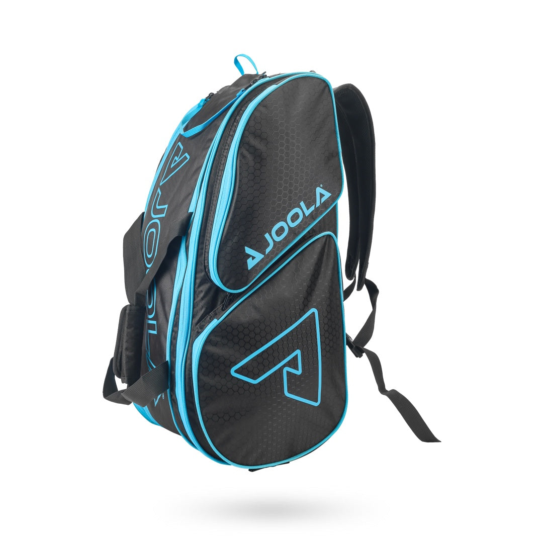 Black and blue Pickleballist branded sports backpack standing upright against a white background.