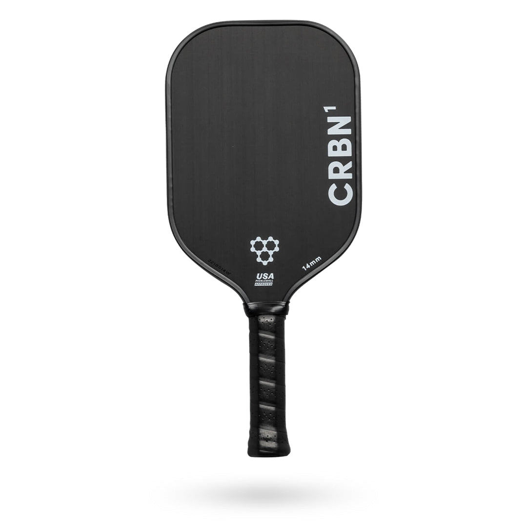 A black Pickleballist CRBN 1 - 14mm pickleball paddle with a textured surface and logo, displayed against a white background.
