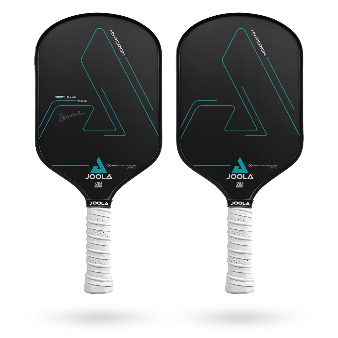 Two JOOLA Simone Jardim Hyperion CFS 16 Swift Pickleball Paddles with black faces and white handles, featuring teal geometric designs and Simone Jardim's signature on one paddle. The CARBON FRICTION SURFACE ensures exceptional control and spin for an enhanced playing experience.