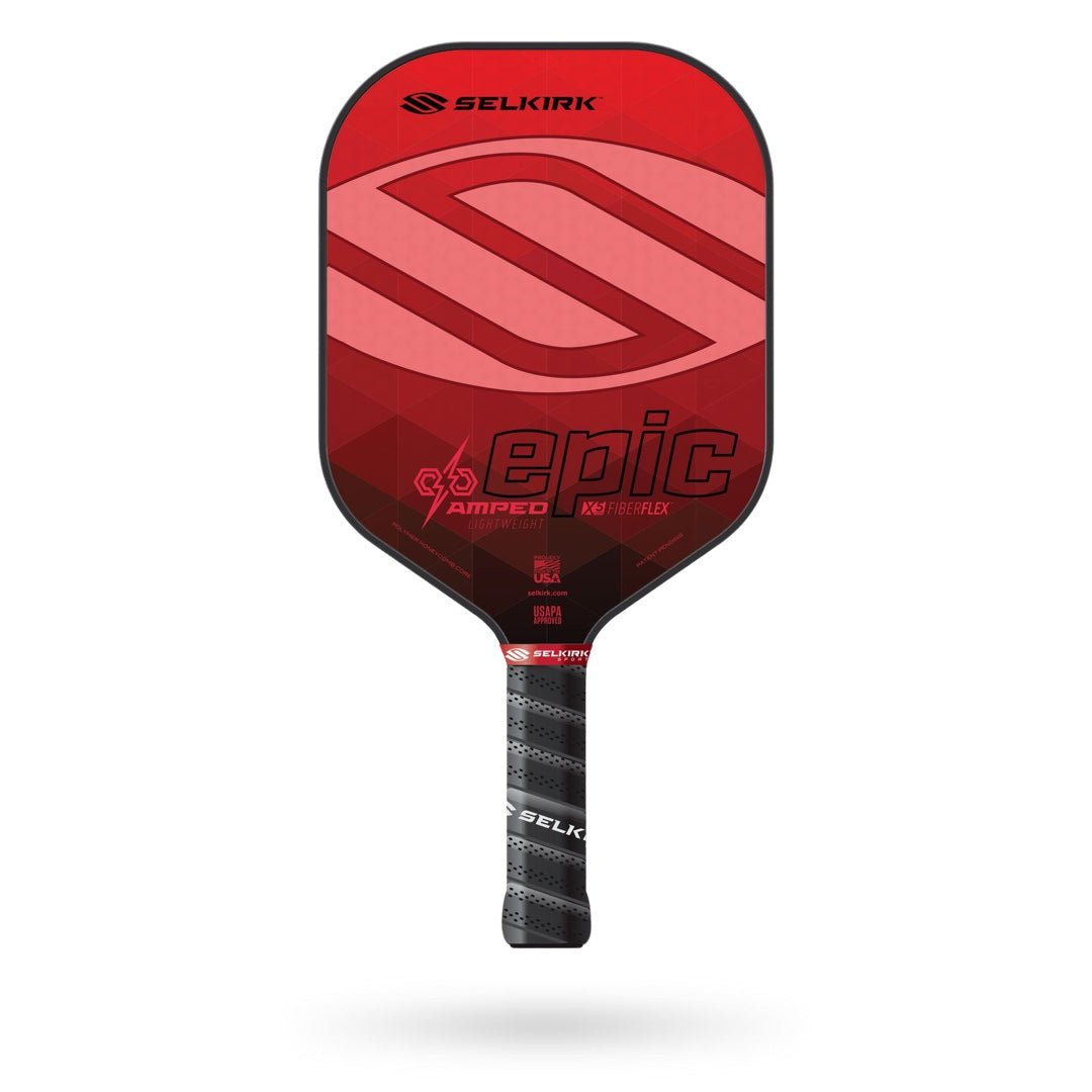 Red and black Pickleballist Selkirk Amped Epic pickleball paddle with logo and textured handle, isolated on a white background.