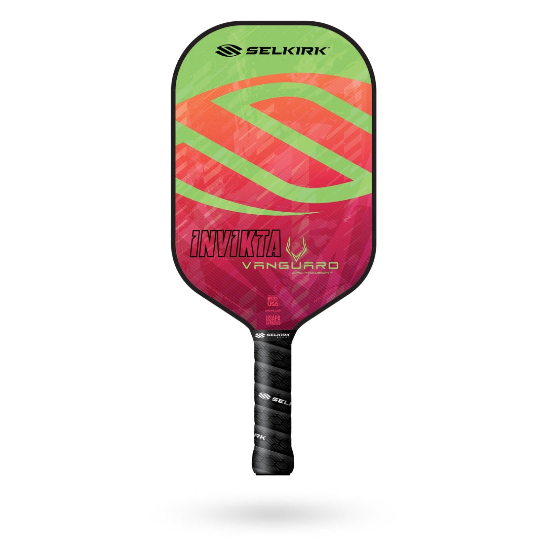 The Selkirk Vanguard Invikta Pickleball Paddle features a vibrant pink, red, green, and black color scheme and a wrapped handle. Enjoy peace of mind with its limited lifetime warranty by Selkirk.