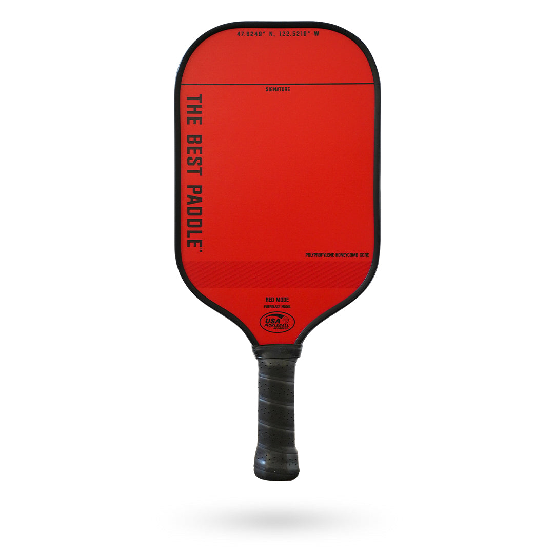 The Best Paddle" Fiberglass Pickleball paddle by Pickleballist, with geographic coordinates and a black grip on a white background.