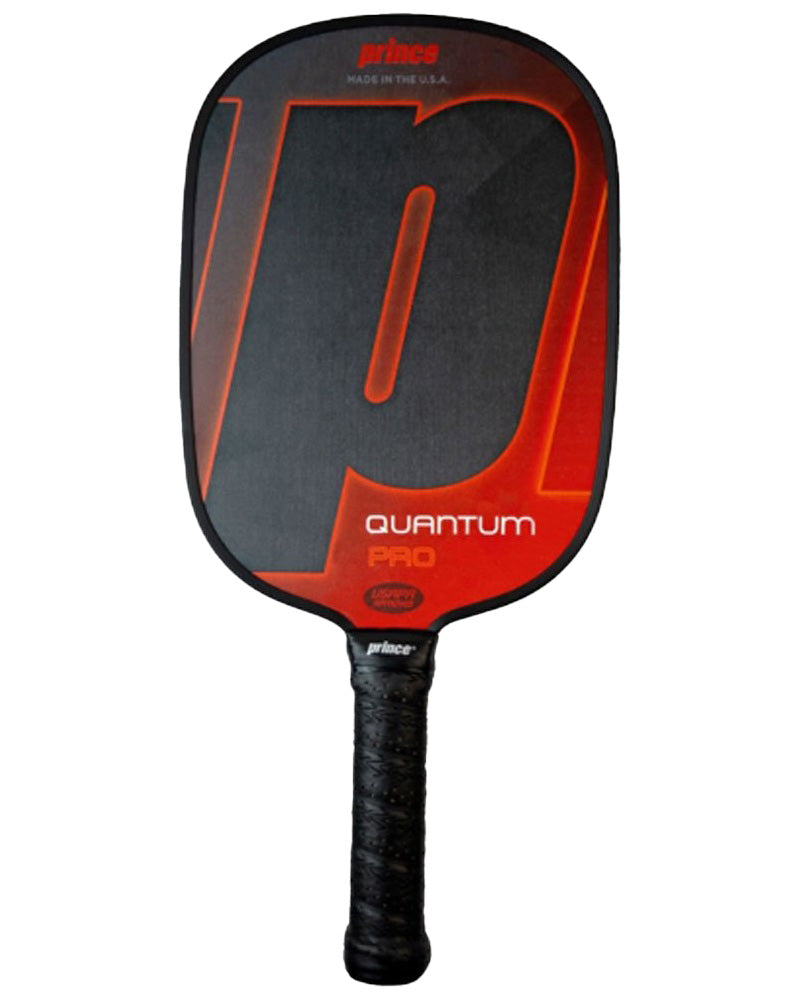 An image of a black and red Prince Quantum Pro Pickleball Paddle, boasting Progressive Core Technology, features a black grip with extra handle length and a large "P" logo prominently displayed on the face.