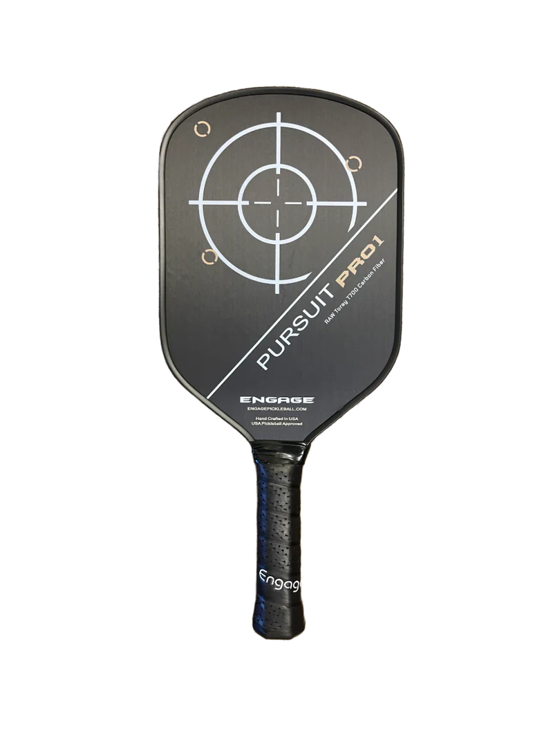 A black Engage Pursuit Pro1 Power Series Pickleball Paddle with a circular target design in the center and the text "Pursuit PRO 1" and "Engage" on the front, held vertically against a white background.