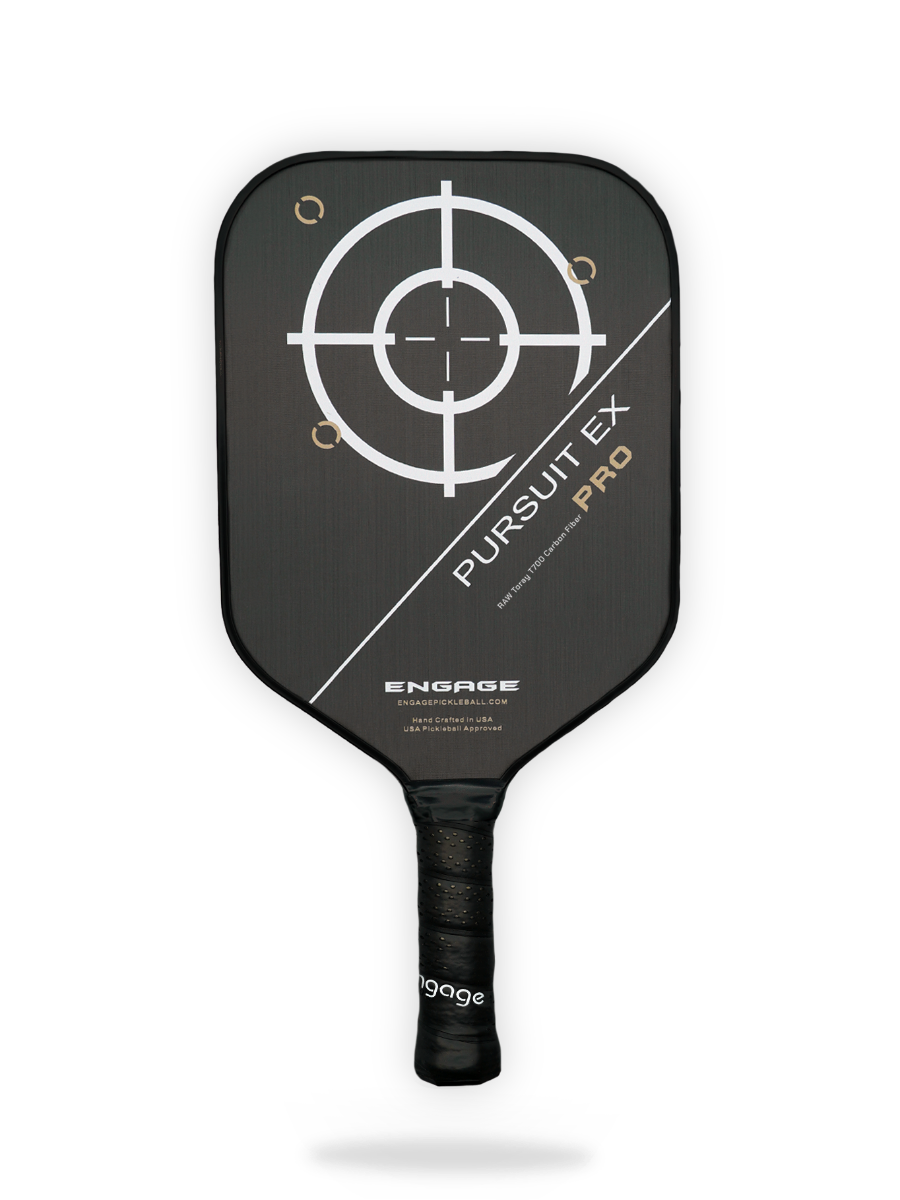 A Engage Pursuit Pro EX pickleball paddle by Pickleballist, featuring a target design on the face, against a black background.