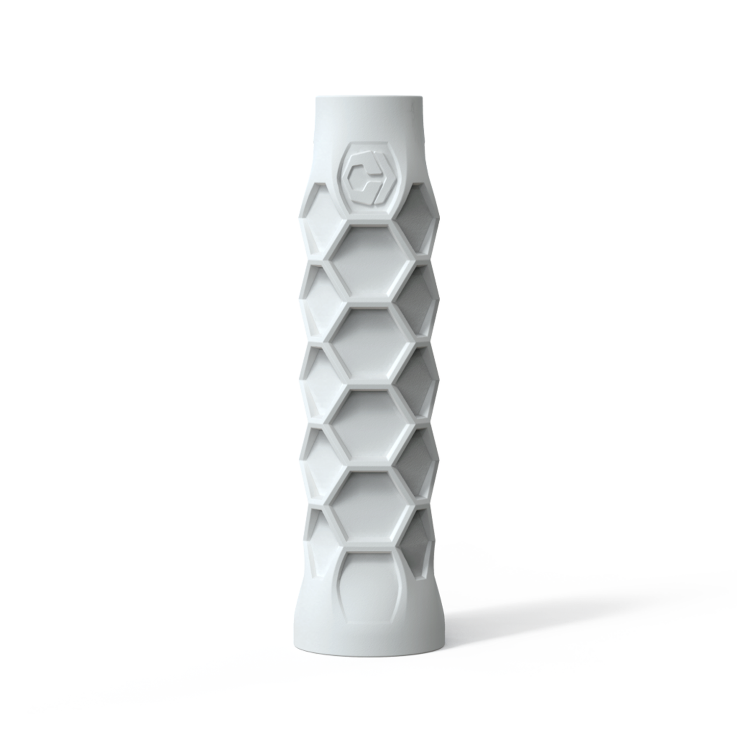 White, cylindrical Hesacore Original Pickleball Grip featuring a honeycomb pattern and a logo near the top.