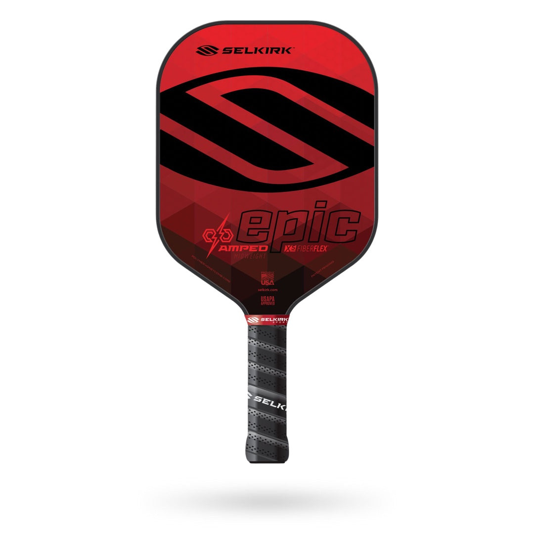A red and black Pickleballist Selkirk Amped Epic pickleball paddle with brand logos and a textured grip handle, displayed against a white background.