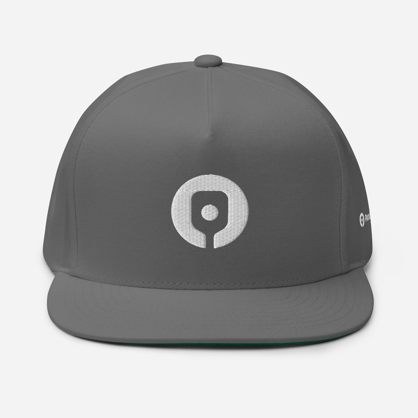 Introducing the Pickleballist Signature Logo Flat Brim Pickleball Hat by Pickleballist: a gray flat-bill cap showcasing a white circular logo with a geometric design on the front and a smaller matching logo on the side. This high-profile fit hat also features a snapback closure for adjustable comfort.