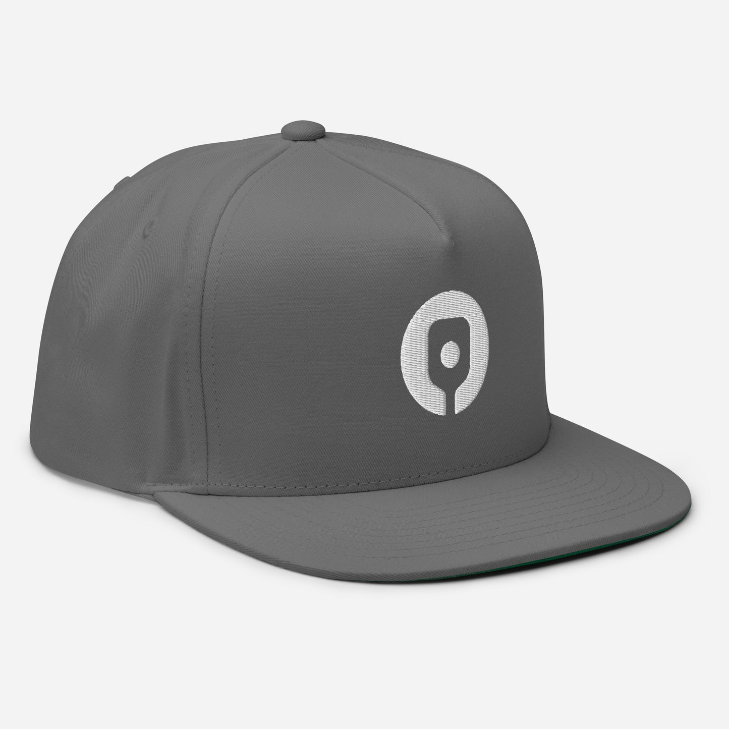 The Pickleballist Signature Logo Flat Brim Pickleball Hat by Pickleballist is a gray snapback cap with a white circular logo on the front, featuring a high-profile fit and flat-bill design.
