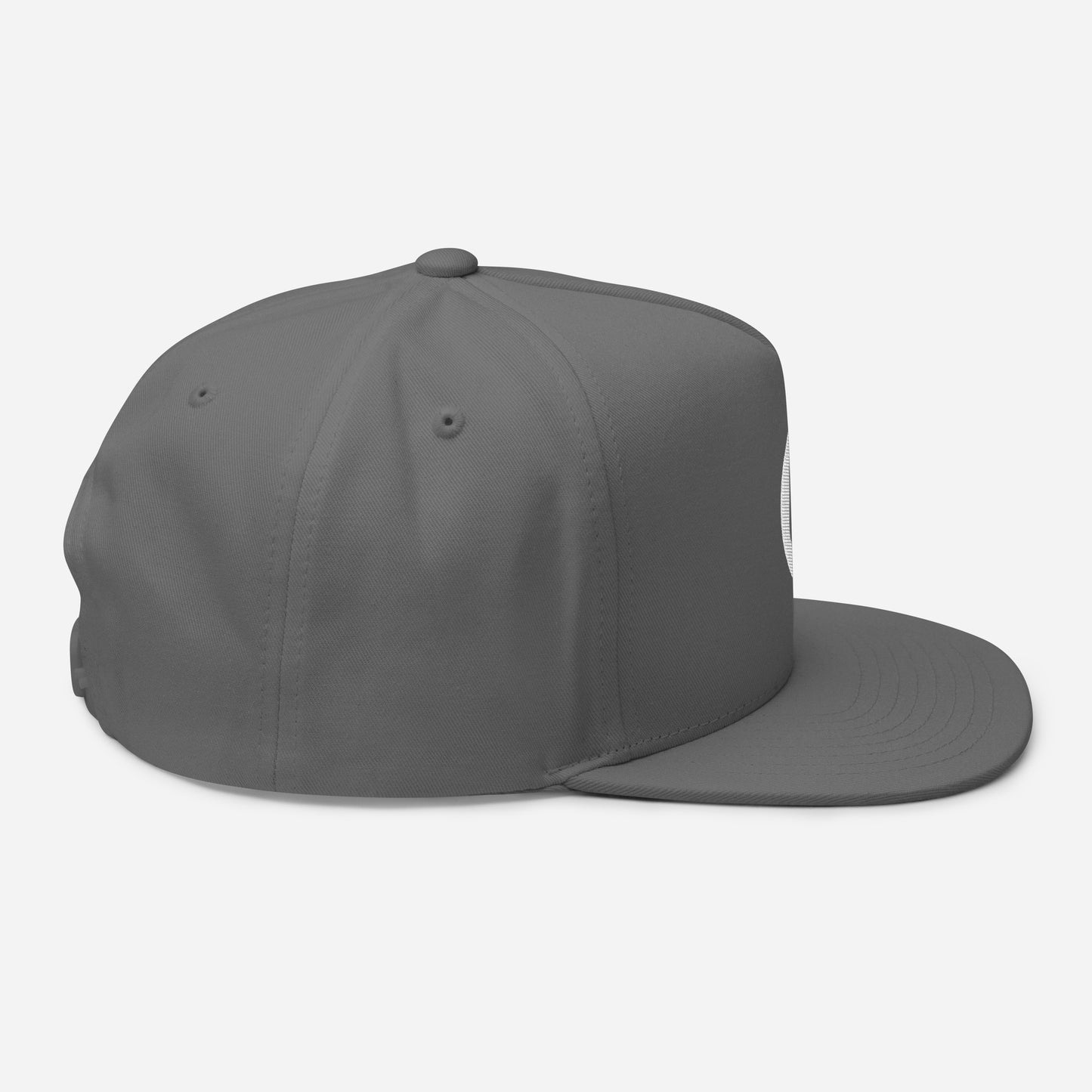 A gray Pickleballist Signature Logo Flat Brim Pickleball Hat with a high-profile fit, viewed from the side, showcasing its six-panel construction and ventilation holes.
