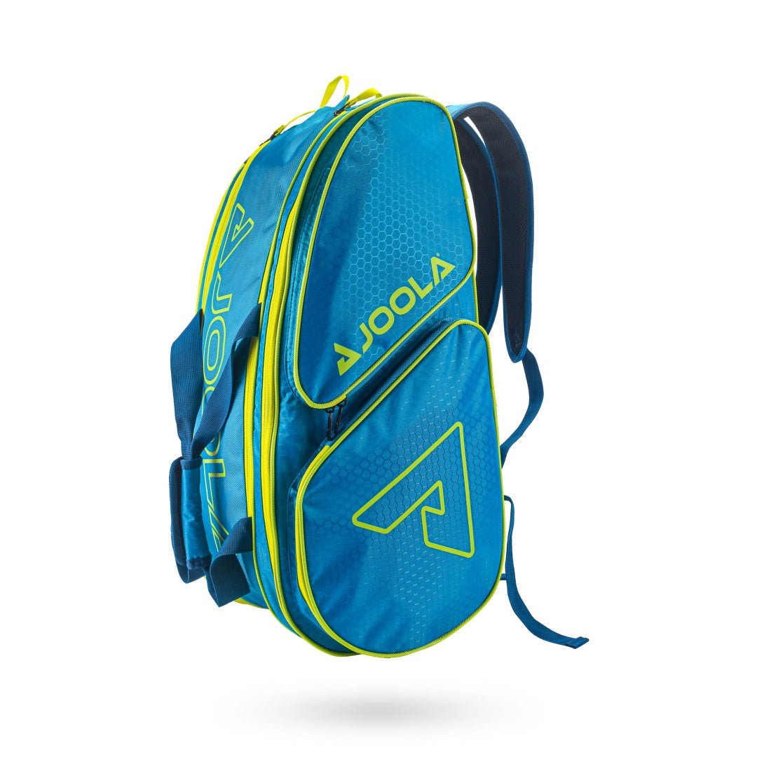 Blue and yellow Pickleballist branded JOOLA Tour Elite Bag Pickleball Bag with multiple compartments on a white background.