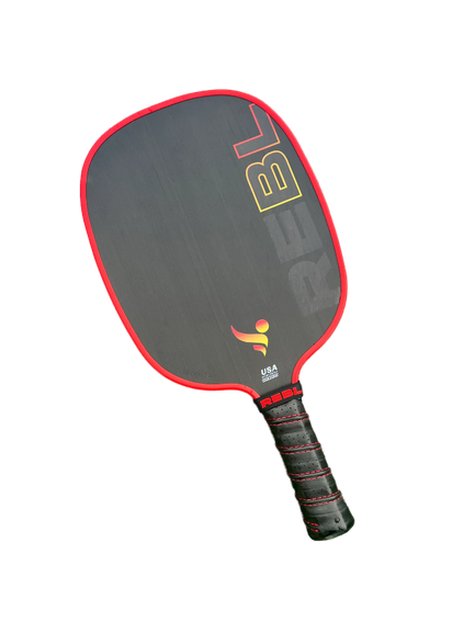 A REBL Mission 13mm Pickleball Paddle on a black background.