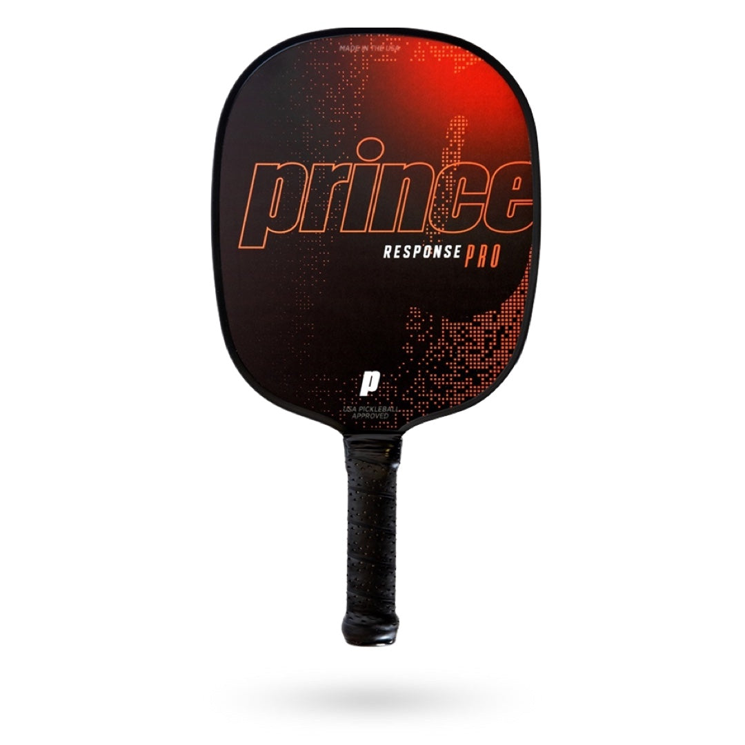 A Pickleballist Response Pro pickleball paddle with a large sweet spot and a black and orange design, isolated on a white background.