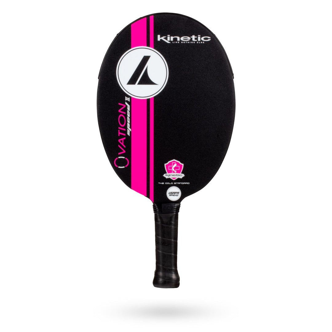 A black and pink pickleball paddle with the word "Ovation" in pink, featuring the "Kinetic" logo in white, a black handle, and Opti-Cell Core construction for enhanced performance.