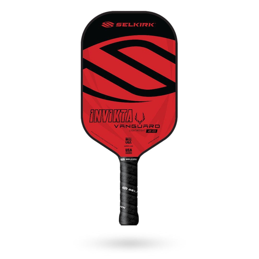 Red and black Selkirk Vanguard Invikta Pickleball Paddle with "INVICTA VANGUARD 2.0" text and a stylized 'S' logo on the paddle face. The handle is wrapped in black grip tape. Made in the USA, this durable paddle comes with a limited lifetime warranty.