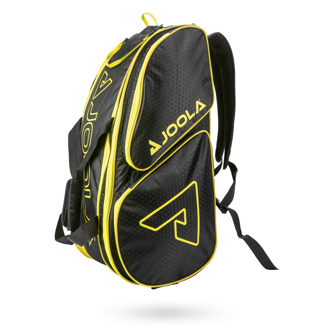 Black and yellow Pickleballist backpack designed for table tennis gear, displayed against a white background.