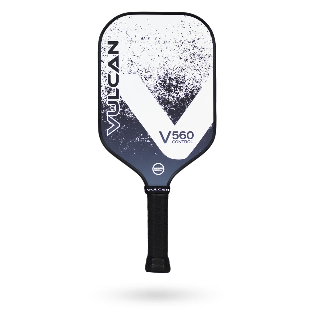 Black and white Vulcan V560 Pickleball Paddle with the word "VULCAN" on the left side and "V560 CONTROL" centered on the top face. Ideal for all-court players, this paddle features a polypropylene core that enhances control and precision.