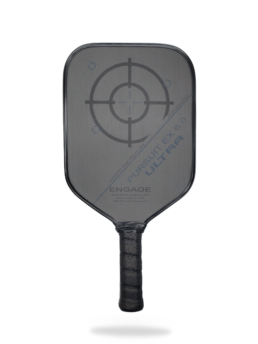 An Engage Pursuit ULTRA EX 6.0 Pickleball Paddle with a target on it.