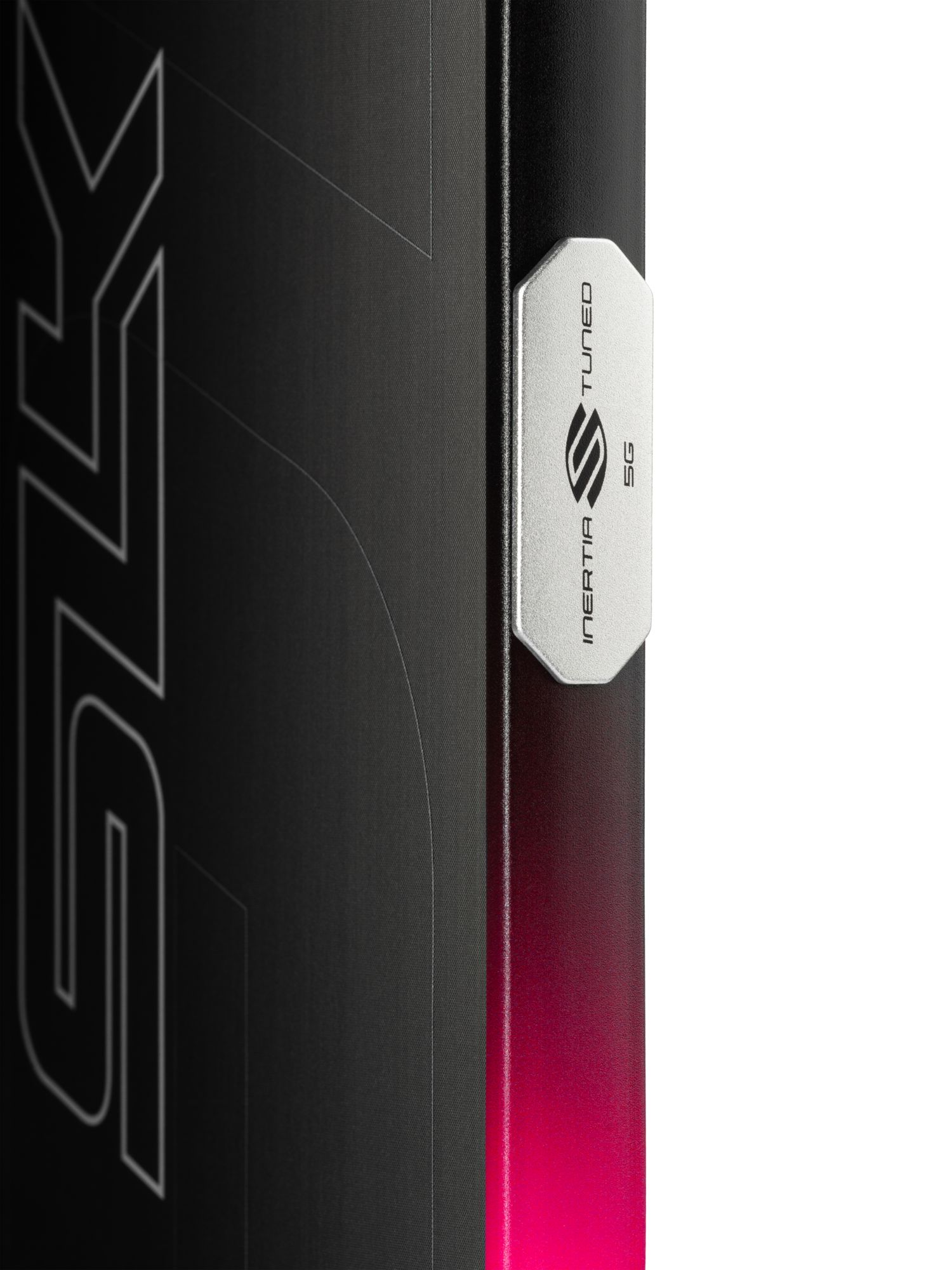 Close-up of a metallic Selkirk badge on a black and pink gradient surface, highlighting the Selkirk SLK GEO Widebody 14mm Pickleball Paddle with partial stylized text—a tribute to its widebody design.