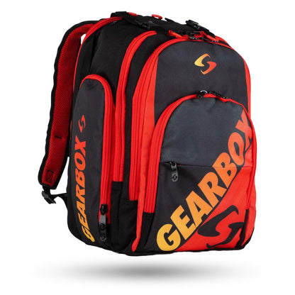 Red and black full-sized backpack with multiple spacious compartments, featuring the text "Gearbox Court Backpack Pickleball Bag" in bold yellow letters on the front pocket. Durable and practical, it’s perfect for all your storage needs.