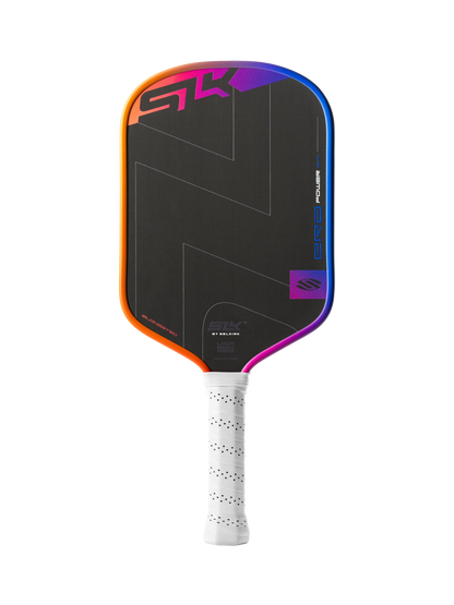 The Selkirk SLK ERA Power Elongated Carbon Fiber Pickleball Paddle features a black face, white perforated grip, and a vibrant orange, pink, blue, and purple border.