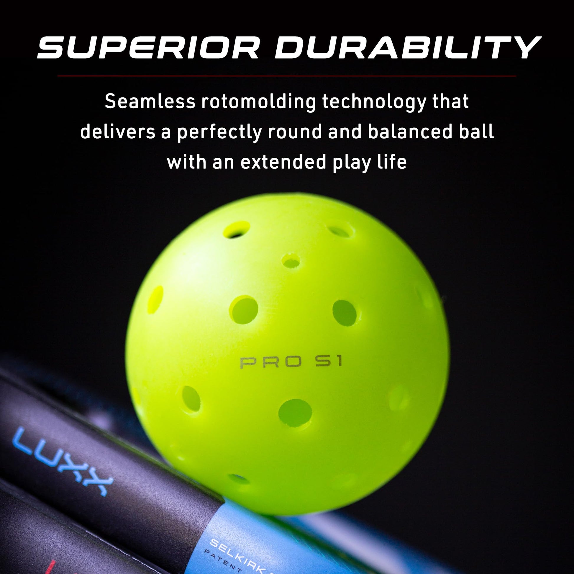 Close-up of a vibrant green Selkirk Pro S1 Pickleball ball, showcasing its seamless rotomolding and superior durability with a 1-year no-crack warranty. Two pickleball paddles are prominently displayed in the foreground.
