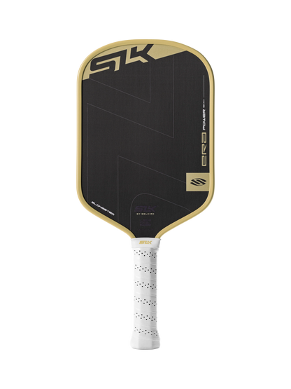 The Selkirk SLK ERA Power Elongated Carbon Fiber Pickleball Paddle features a black design with gold trim, a white grip, and the Selkirk name on the face—crafted from carbon fiber for enhanced spin and control.