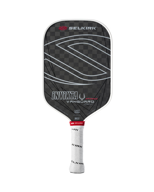 A Selkirk Vanguard Pro Invikta pickleball paddle featuring a black and gray checkered face, white edges, and a white handle, with the model name "Vanguard Pro Invikta" printed on the face.