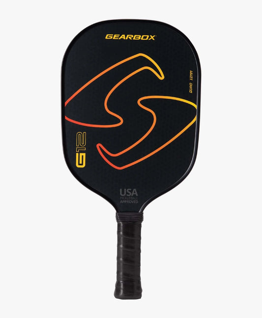 A black Gearbox G12 Quad 12mm Widebody pickleball paddle featuring a yellow and orange design, labeled "Gearbox G12" and marked "USA Approved".