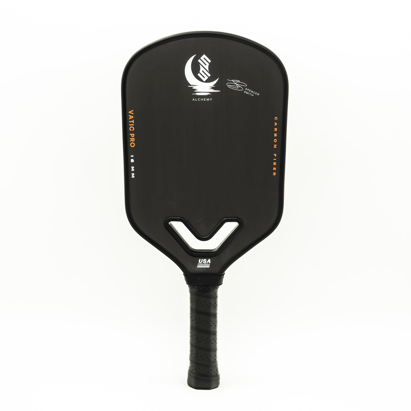 A black pickleball paddle with "Vatic Alchemy 13.5mm," "CARBON FIBRE," and the brand's logo printed on the face, featuring a textured grip handle.