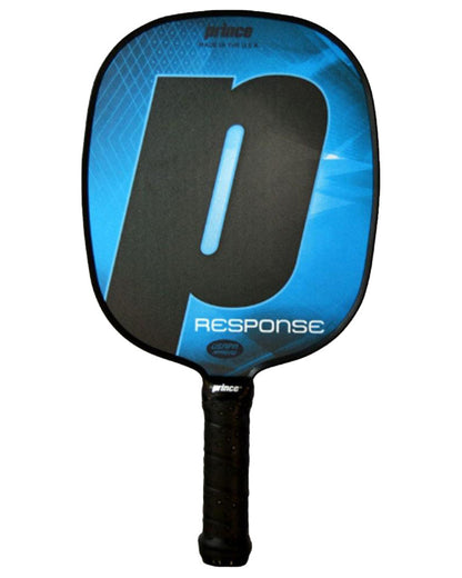 An oval-shaped blue and black Prince Response Pickleball Paddle featuring a large "P" and the word "Response" on its face, designed with a polymer core for enhanced durability and a large sweet spot for optimal performance.