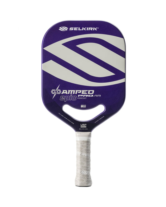 Purple and white pickleball paddle with "Selkirk" logo, "Selkirk AMPED Pro Air Epic Pickleball Paddle" text, and "Weight: Medium" indicated on the handle grip, isolated on a white background.