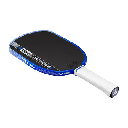 The JOOLA Agassi Pro V 14mm Andre Agassi Royal Blue Pickleball Paddle features a black body with blue edges, a white grip handle, rectangular shape, and carbon fiber technology for professional-level play.