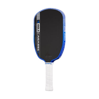 The JOOLA Agassi Pro V 16mm Andre Agassi Royal Blue Pickleball Paddle features a black and blue design with a white grip, JOOLA logos on the face, and carbon fiber construction for pro-level performance.