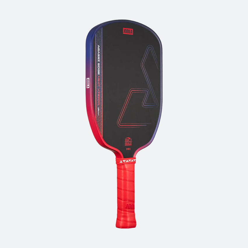 A JOOLA Heat Vision Agassi Edge 16mm Pickleball Paddle in black with red and blue accents, a red grip handle, and Heat Vision technology is displayed against a plain light background.