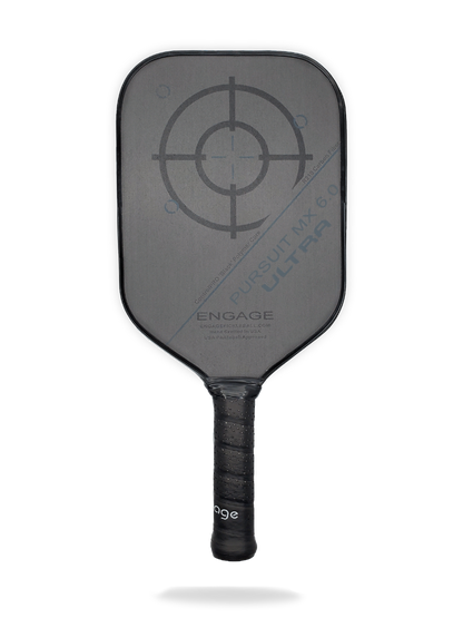 A black Engage Pursuit ULTRA MX 6.0 Pickleball Paddle with a large bullseye graphic on the face and the text "Pursuit MX 6.0 Ultra" and "Engage" printed on it. The handle is wrapped with a textured grip.