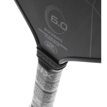 Close-up of a Six Zero Black Diamond Power (16mm) Pickleball Paddle with the branding "Pickleballist" visible on the rubber and embossed on the handle, isolated against a white background.