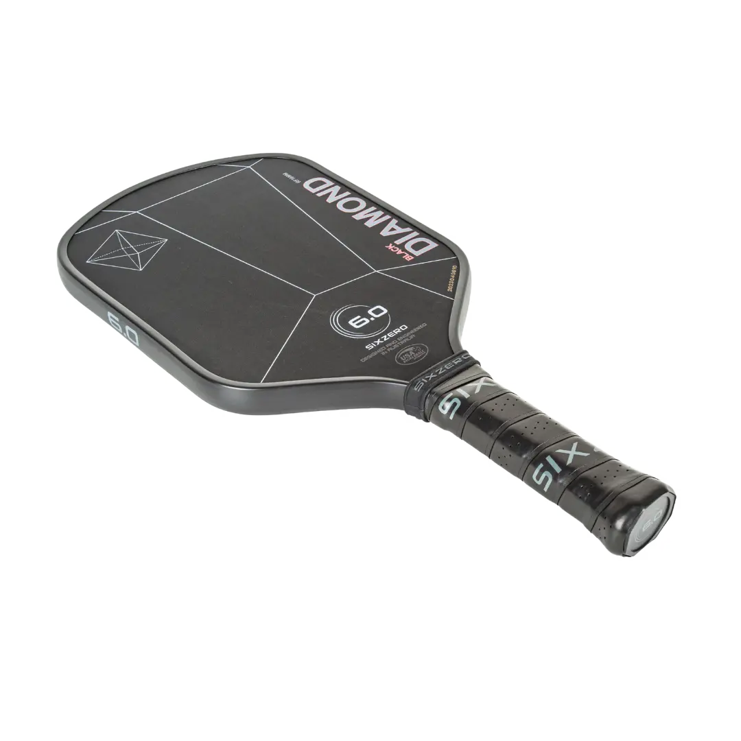 A black and grey Pickleballist Six Zero Black Diamond Power (16mm) pickleball paddle with white text and logo, featuring a dial on the handle, isolated on a gray background.