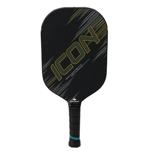 Black pickleball paddle with "Diadem Icon V2 XL Pickleball Paddle" written in gold letters across the face, featuring a grip handle and the brand name "Diadem" at the bottom.