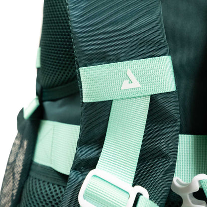 Close-up of the JOOLA Utility Backpack, a dark green bag from JOOLA with mint green straps, white plastic buckles, and a small triangular logo on one strap.