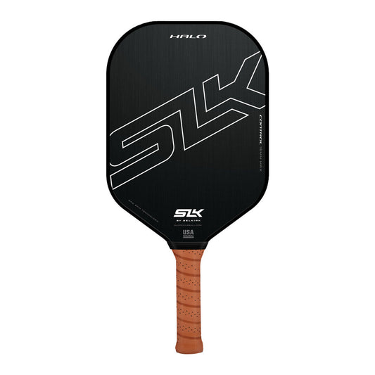 Black and gray Selkirk SLK Halo XL pickleball paddle with white "Pickleballist" lettering and cork handle, isolated on a white background.