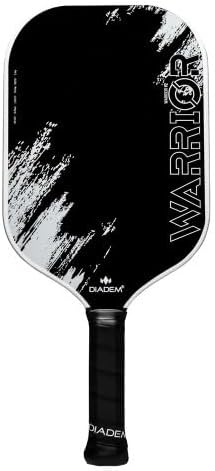 The Diadem Warrior V2 Pickleball Paddle features a textured design with white brush strokes, a black and white color scheme, "Warrior" written vertically on one side, and "Diadem" near the handle.