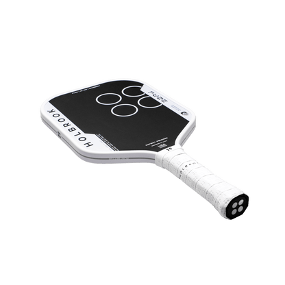 The Holbrook Fuze Widebody 16mm Pickleball Paddle features a black and white design, a Carbon-Aramid-Carbon face, and four white circles on the front, displayed against a plain white background.